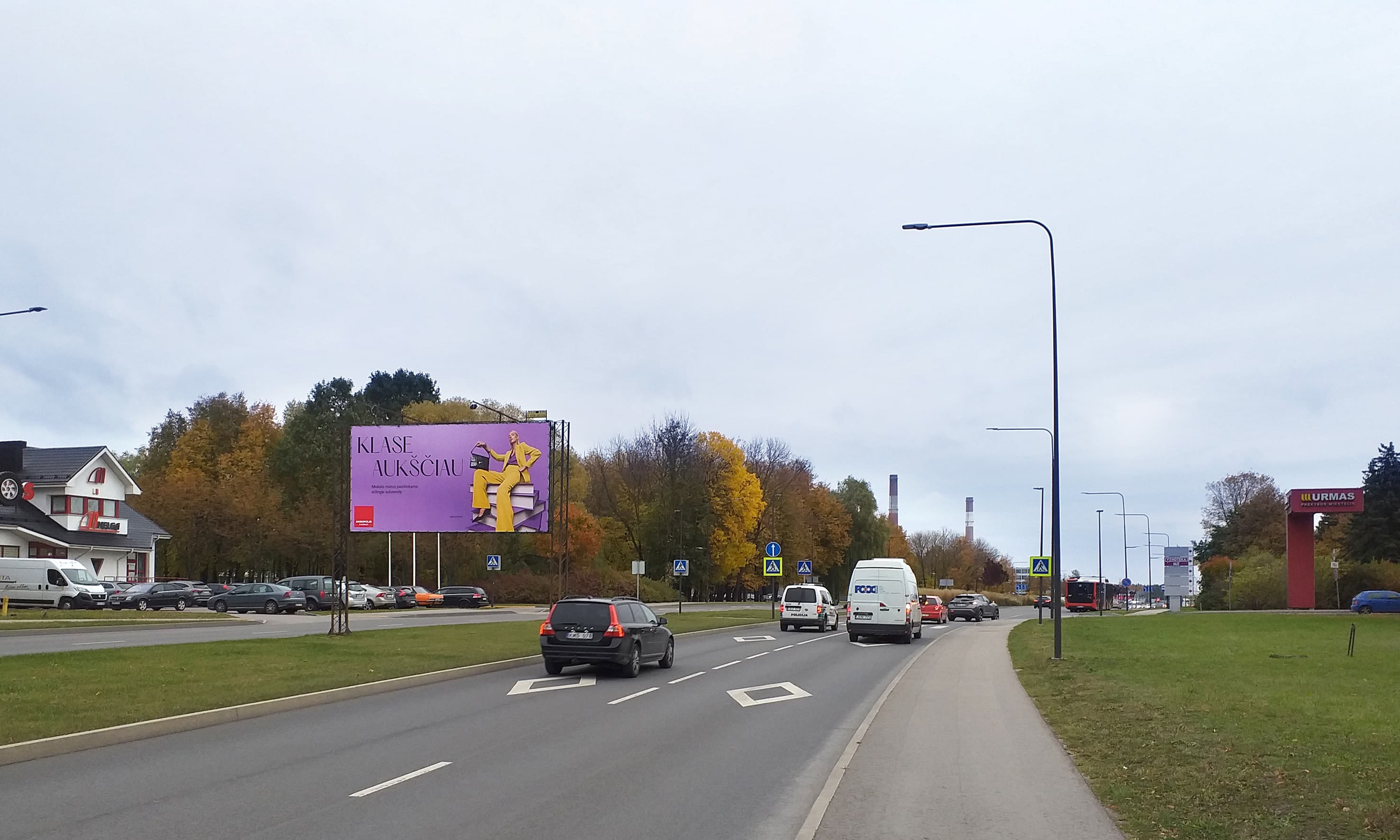 Reklamos stendas – Taikos pr., prie pastato Nr. 127 ("MELGA"), Kaunas (B pusė)
